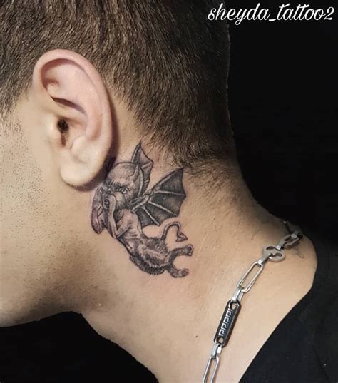 angel whispering in ear neck tattoo|101 Best Angel Whispering In Ear Tattoo Everything You Need。